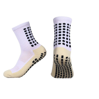 Soccer player wearing grip socks during match with confident foot placement and stability