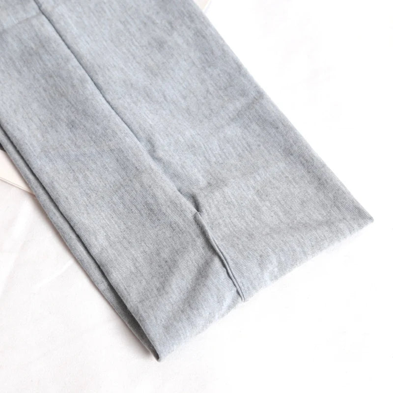 Sweatband headband worn during yoga and fitness training
