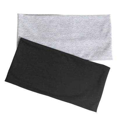 Wide elastic headband detail showing stretch and fit