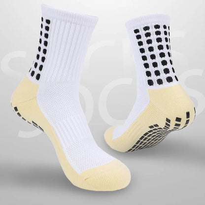 Sole view of both socks showing detailed grip node placement for different movements